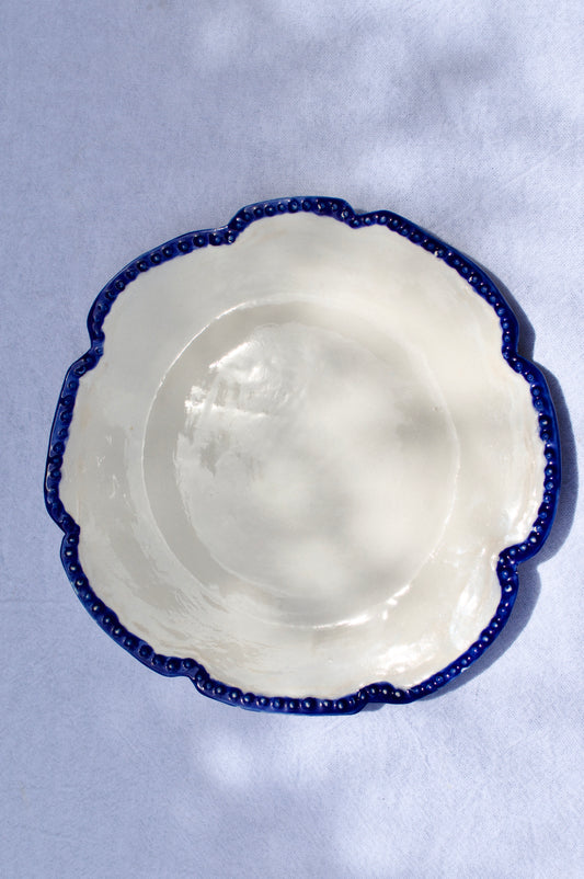 Assiette bord bleu